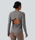 Haut de sport yoga dos nu manches longues avec trous pouces