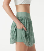 Jupe de sport mini 2-en-1 fluide taille mi-haute en mesh léopard avec poche