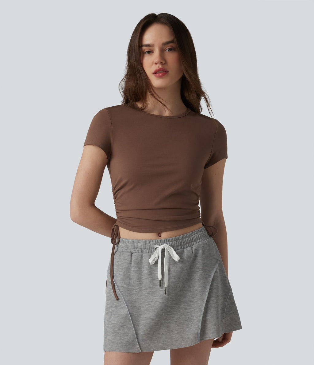 Halara T-shirt décontracté en jersey de coton à col rond, cordon de serrage, dos froncé et ouverture goutte