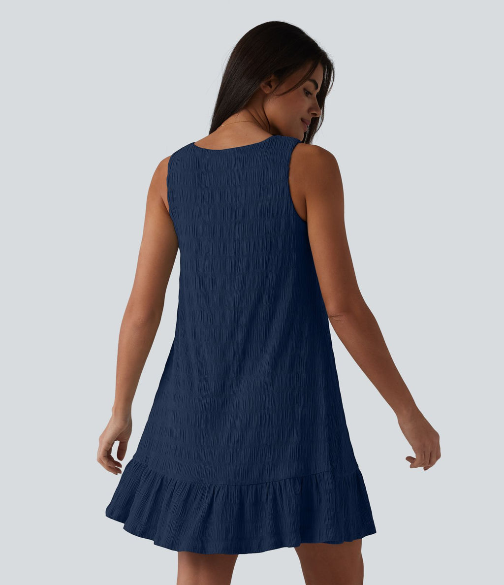 Robe courte décontractée sans manches à col rond, soutien-gorge intégré et ourlet à volants