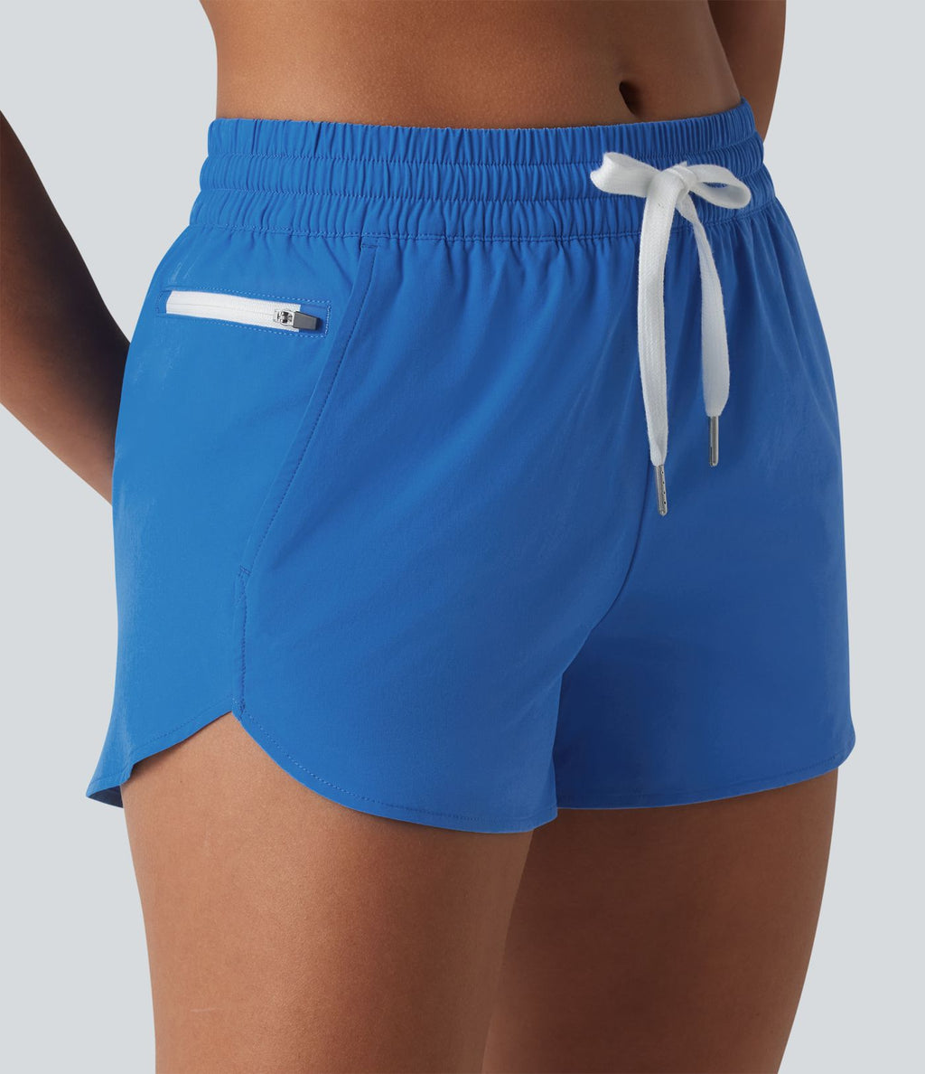 Breezeful™ Short de course taille mi-haute à séchage rapide, cordon de serrage, ourlet arrondi, sous-short intégré et poches