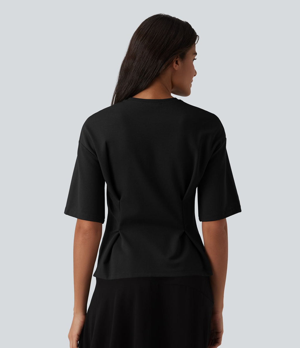 Blouse casual col rond taille cintrée à basque