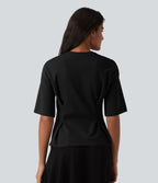 Blouse casual col rond taille cintrée à basque