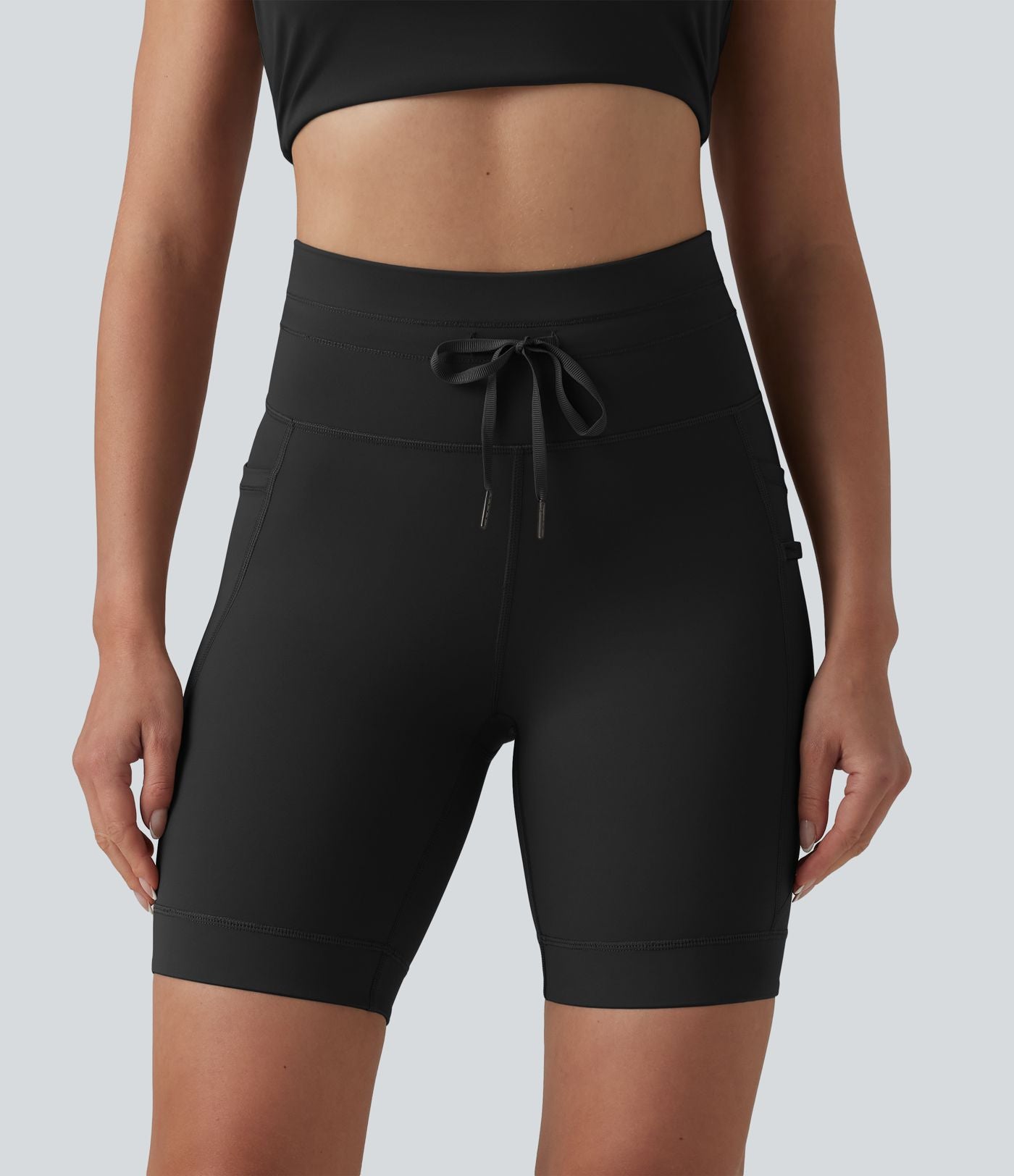 Short de cycliste yoga uni taille haute 17,5 cm avec cordon de serrage et poches