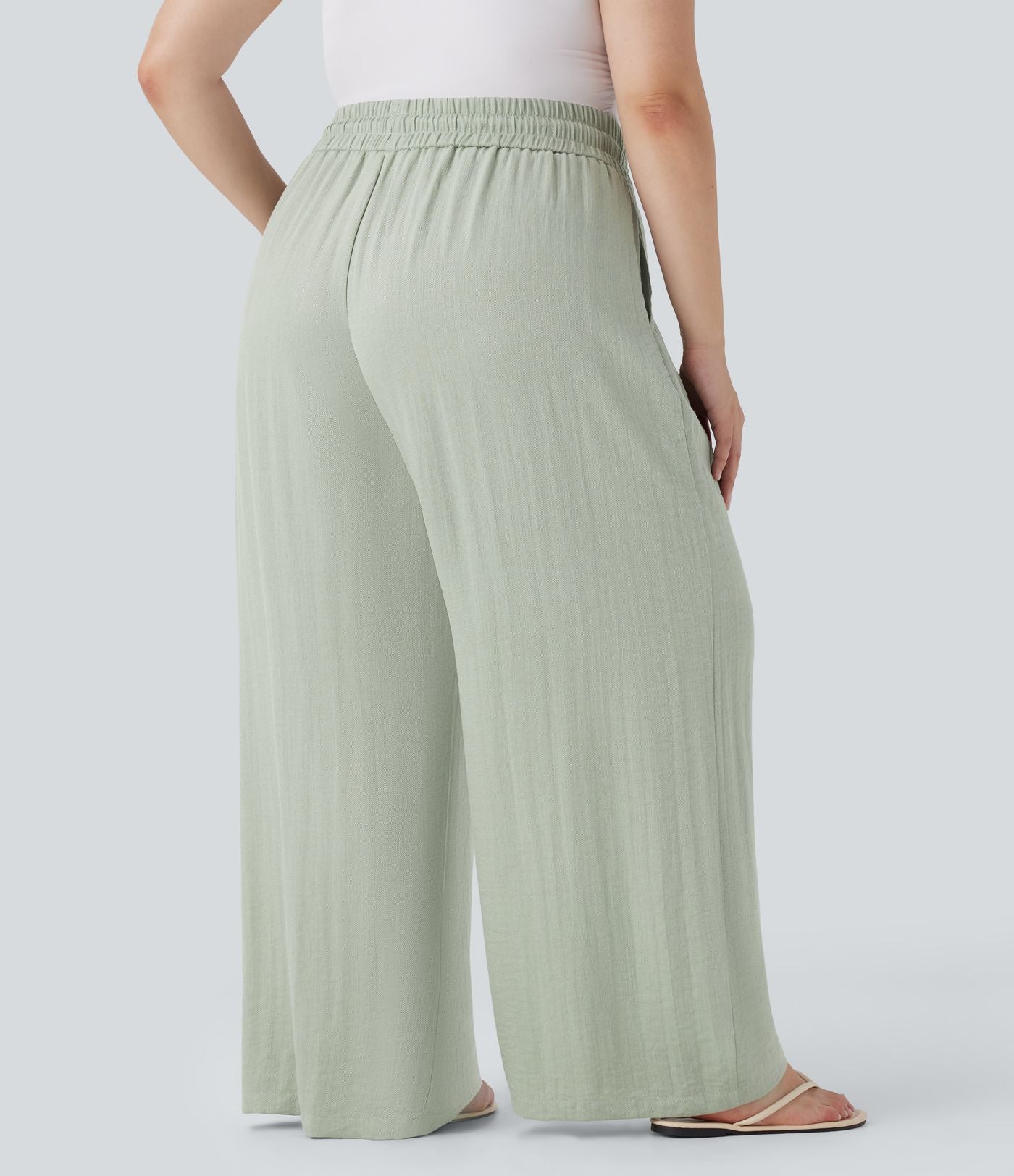 Pantalon décontracté grande taille large fluide taille haute effet lin avec cordon de serrage et poches
