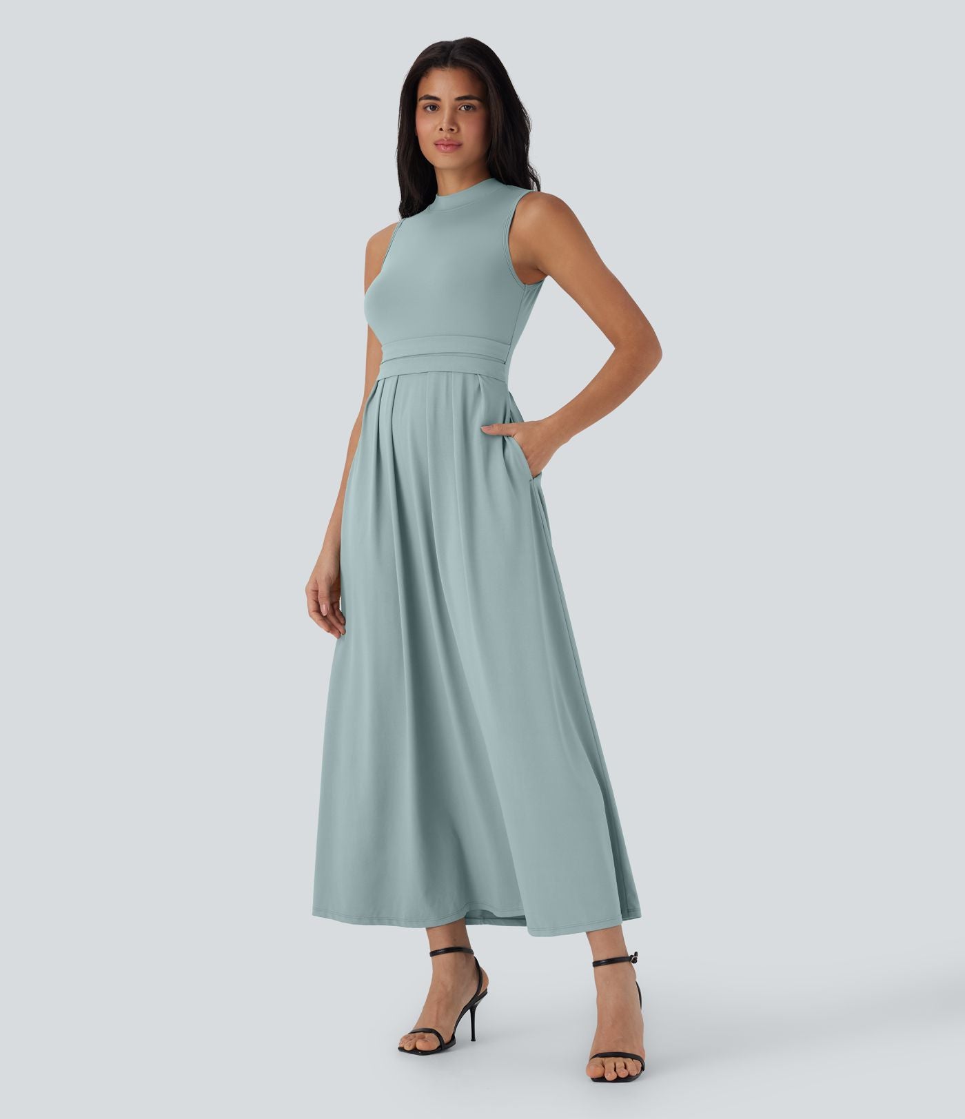Robe longue décontractée sans manches à col montant, coupe évasée et poches latérales
