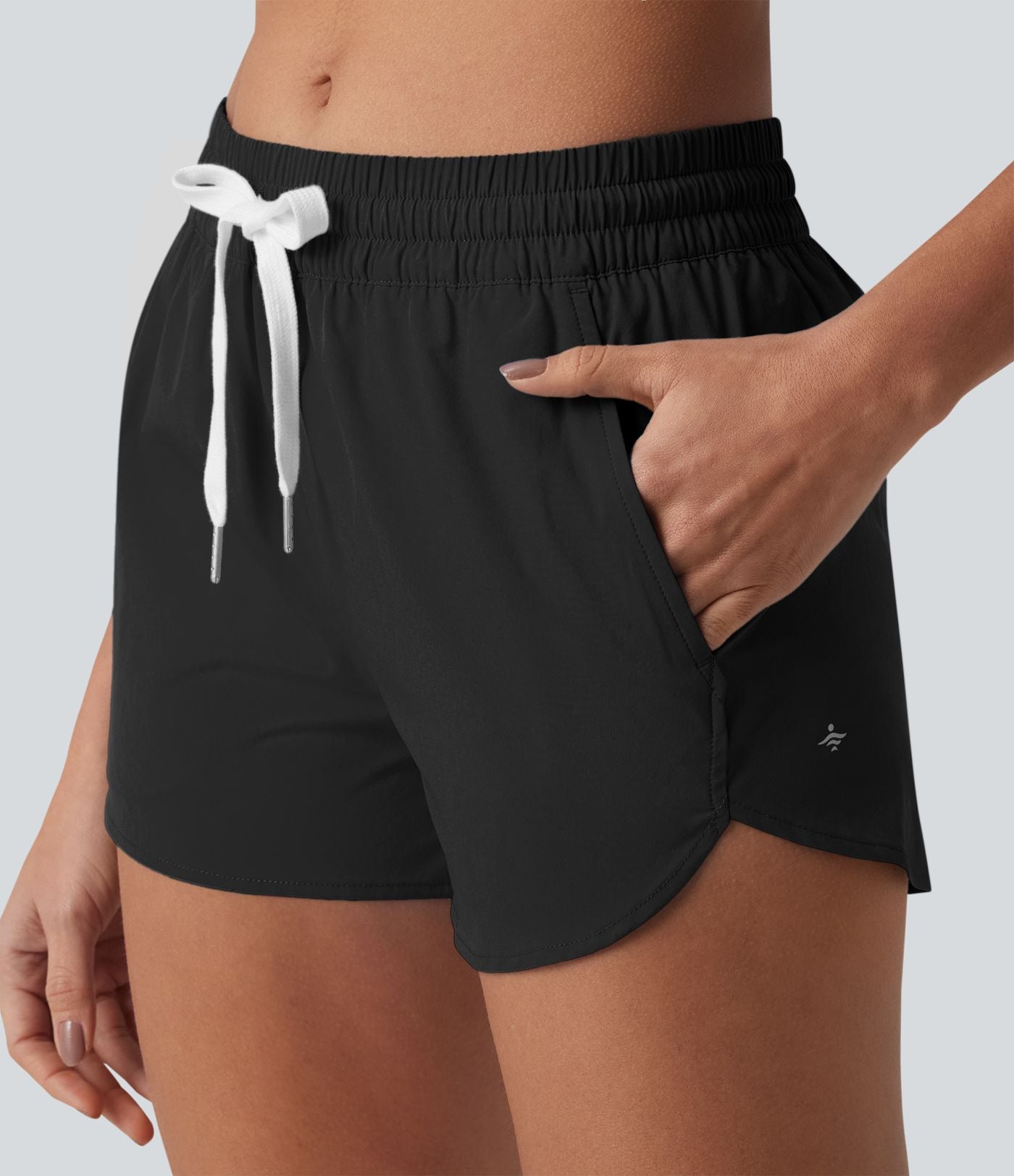 Breezeful™ Short de course taille mi-haute à séchage rapide, cordon de serrage, ourlet arrondi, sous-short intégré et poches
