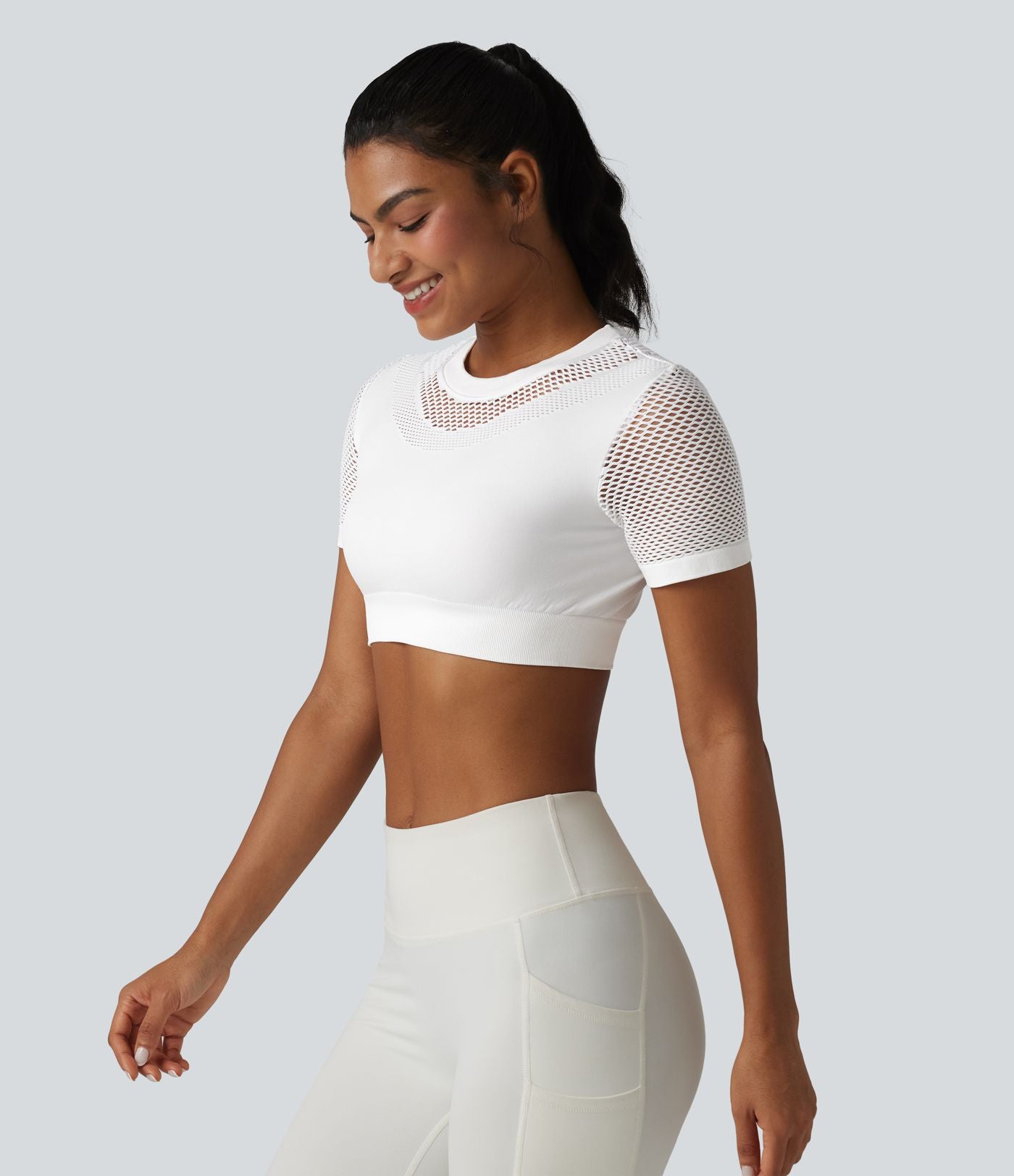 OneForm Seamless Flow Haut de sport crop col rond manches courtes avec découpes