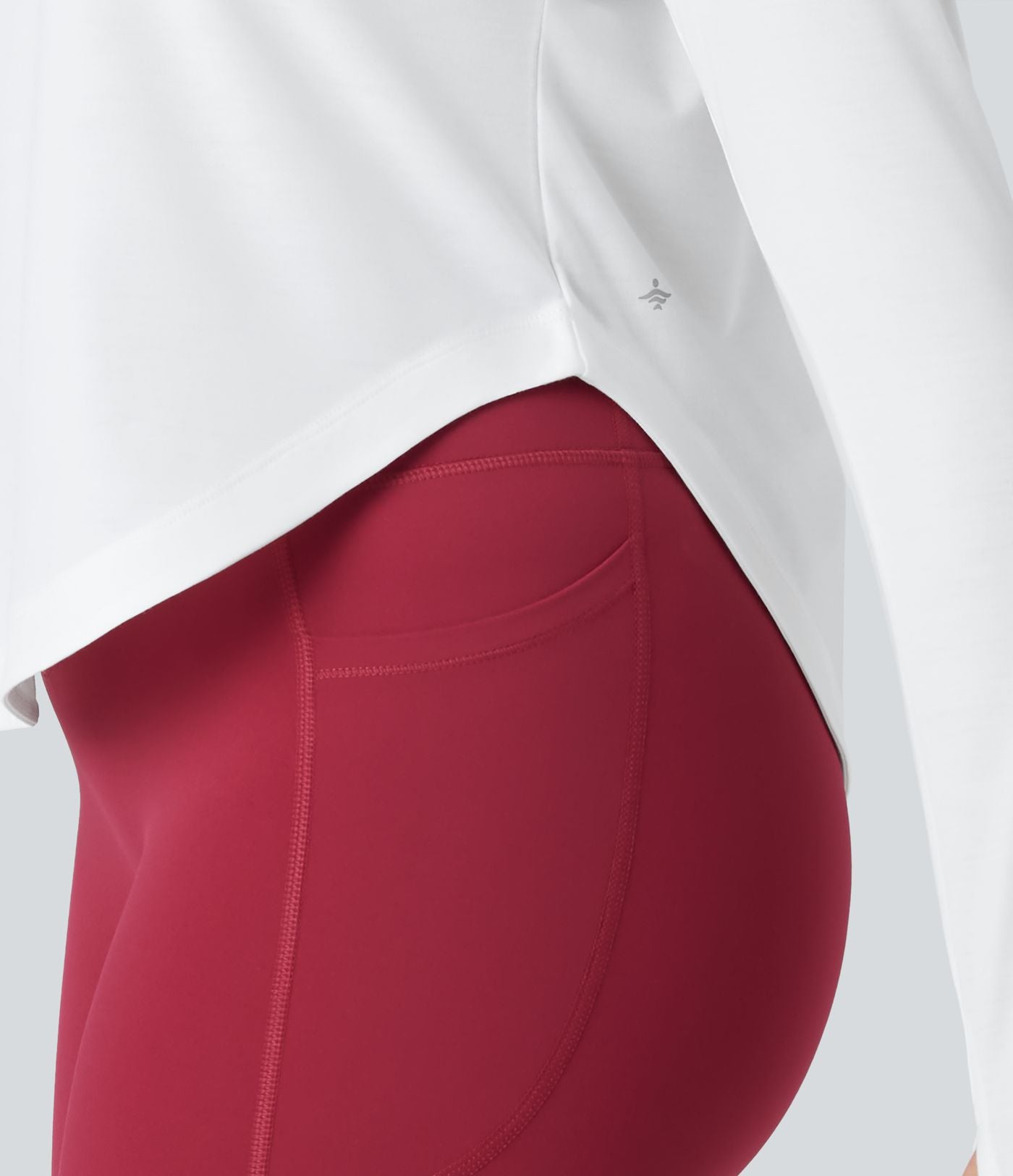 Top de sport yoga asymétrique une épaule manches longues avec trou pour le pouce, ourlet arrondi asymétrique et séchage rapide