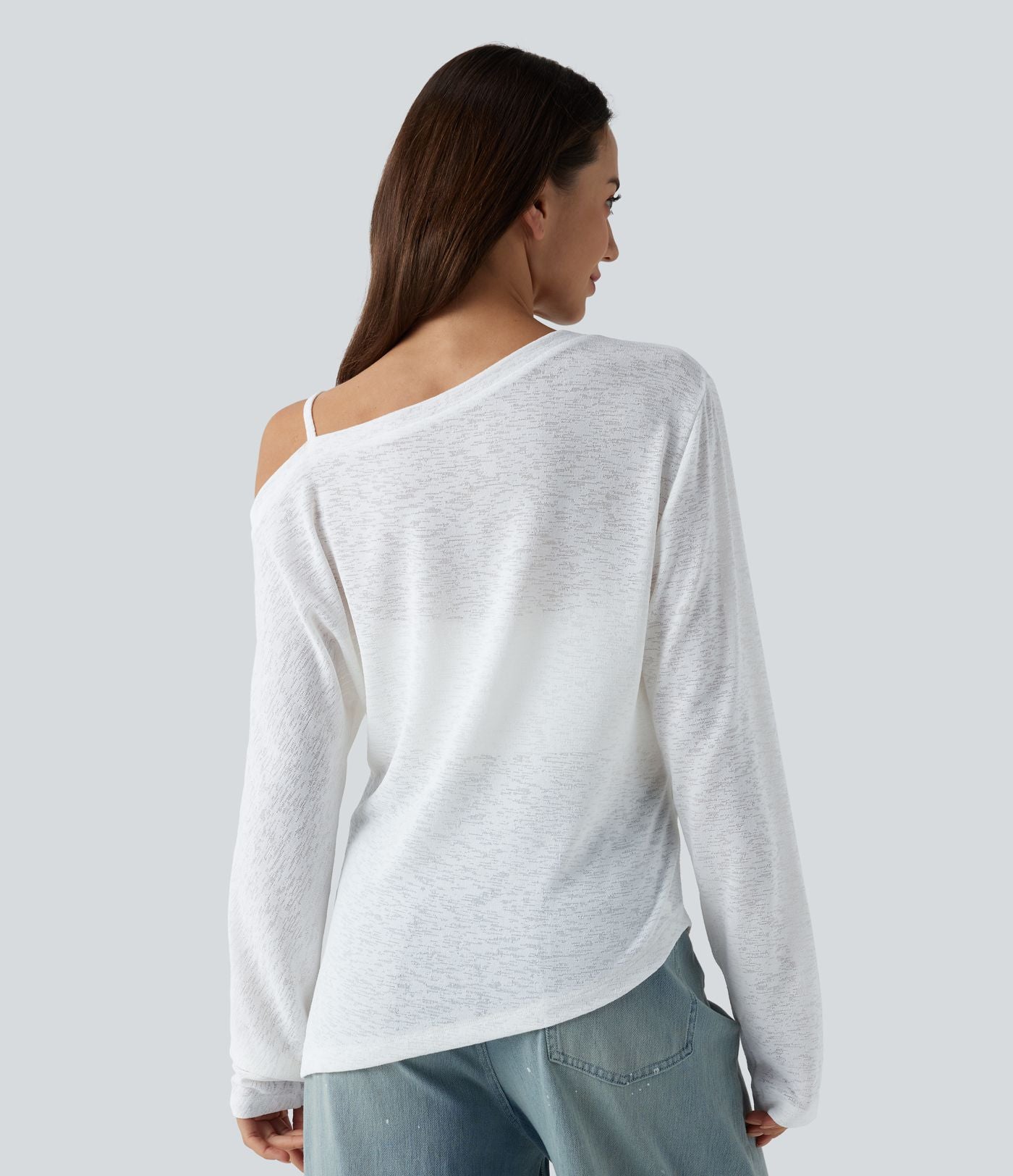 T-shirt décontracté semi-transparent une épaule dénudée à manches longues et ourlet asymétrique