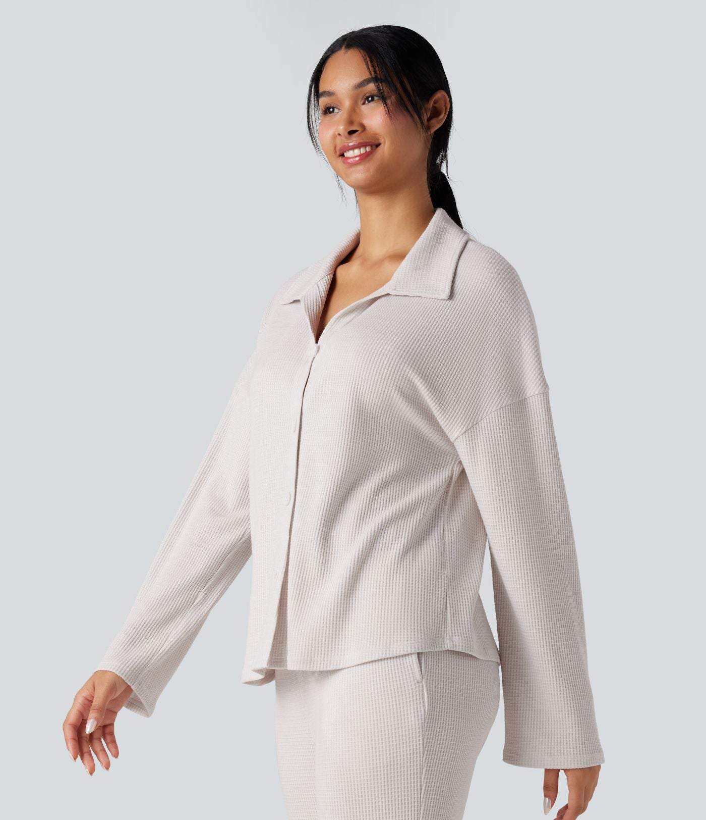Top détente gaufré col tailleur manches longues boutonnage décontracté