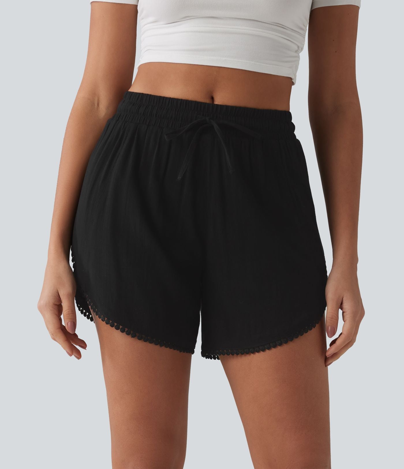Short décontracté 2 en 1 à taille mi-haute, cordon de serrage, franges contrastées et ourlet arrondi