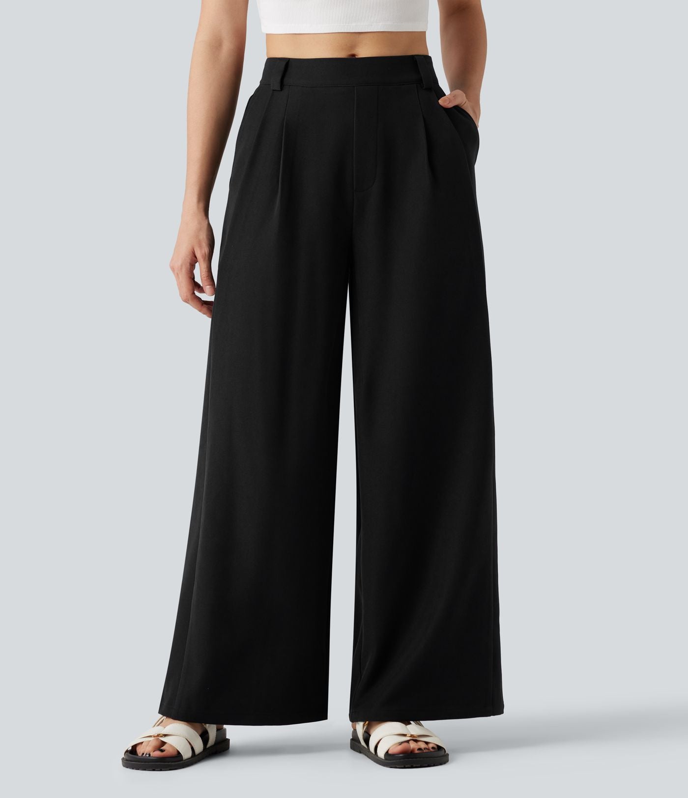 Pantalon tailleur large, taille moyenne, à poches