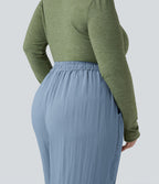 Pantalon grande taille large fluide taille haute avec cordon de serrage, poches et aspect lin