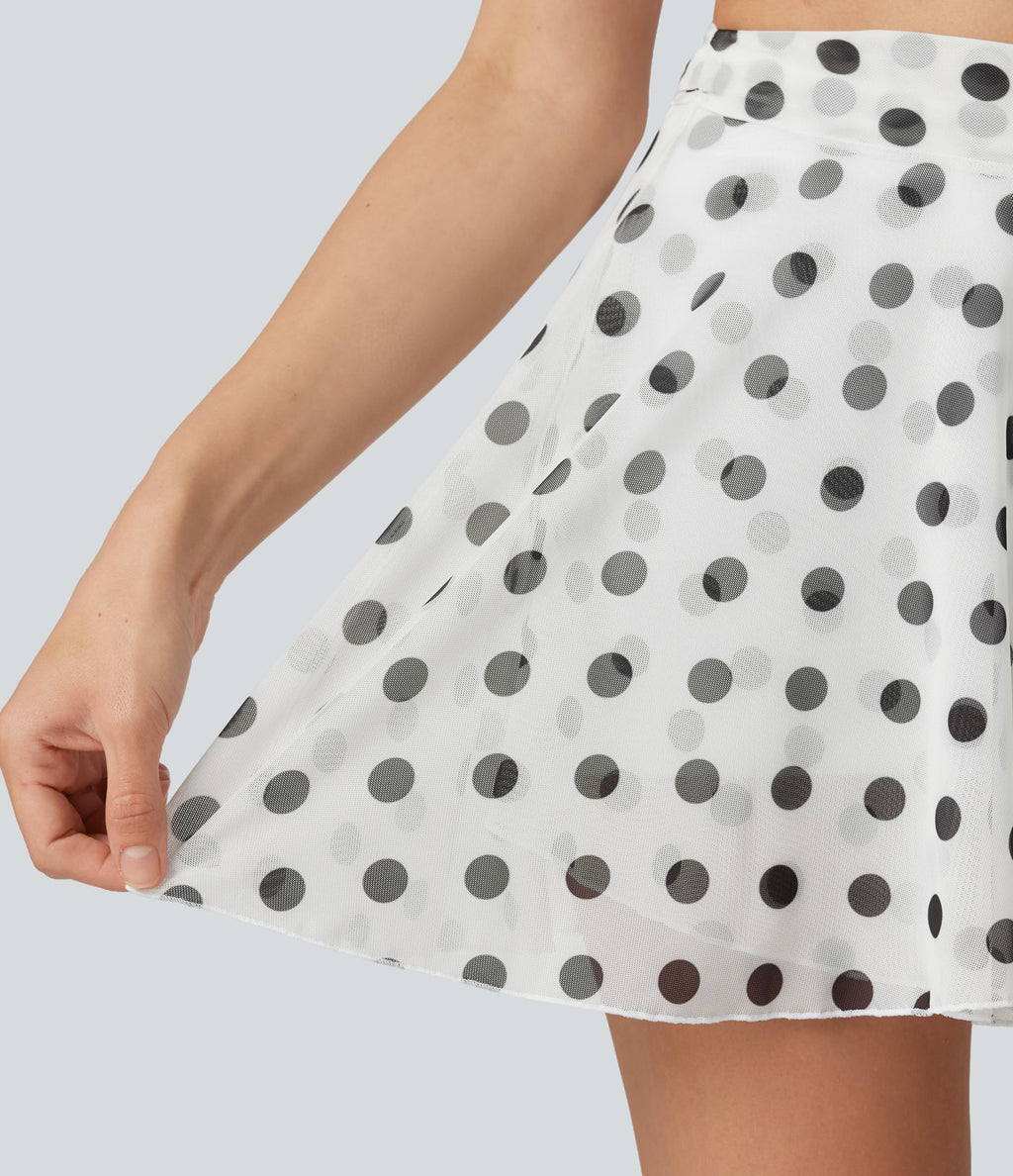 Jupe évasée micro-mini en maille à pois, taille haute, à nouer sur le côté et poche