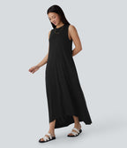 Robe longue décontractée fluide à col rond, sans manches, poches latérales et ourlet asymétrique