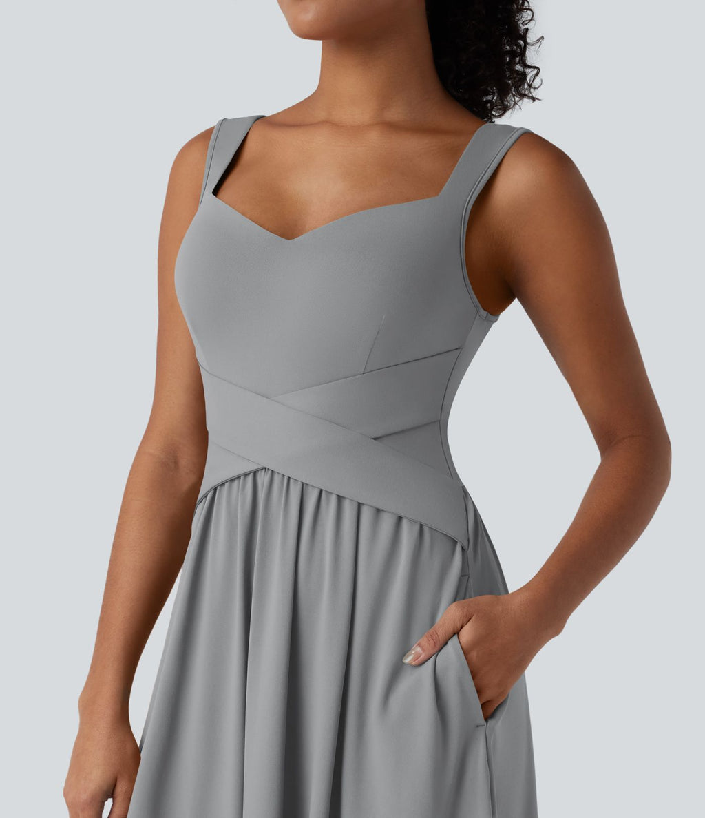 Robe midi fluide sans manches dos croisé ouvert avec poches