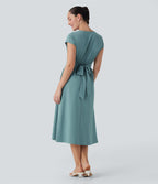 Robe midi Breezeful™ col V manches courtes à liens dans le dos séchage rapide avec poches latérales