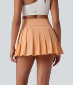 Jupe-short de danse mini Breezeful™ à taille haute, plissée, 2-en-1, avec poches latérales et arrière, ourlet asymétrique et séchage rapide