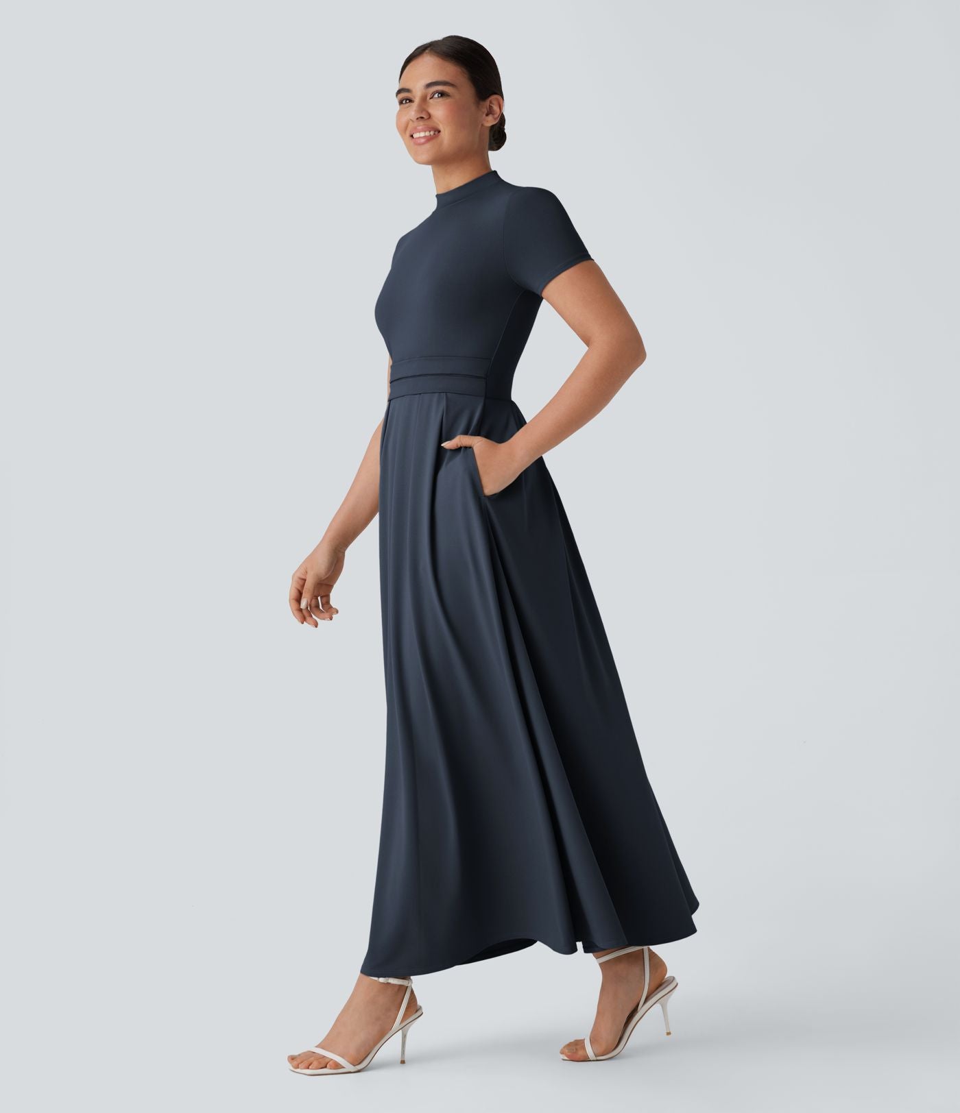 Robe longue décontractée à col montant, manches courtes et poches latérales