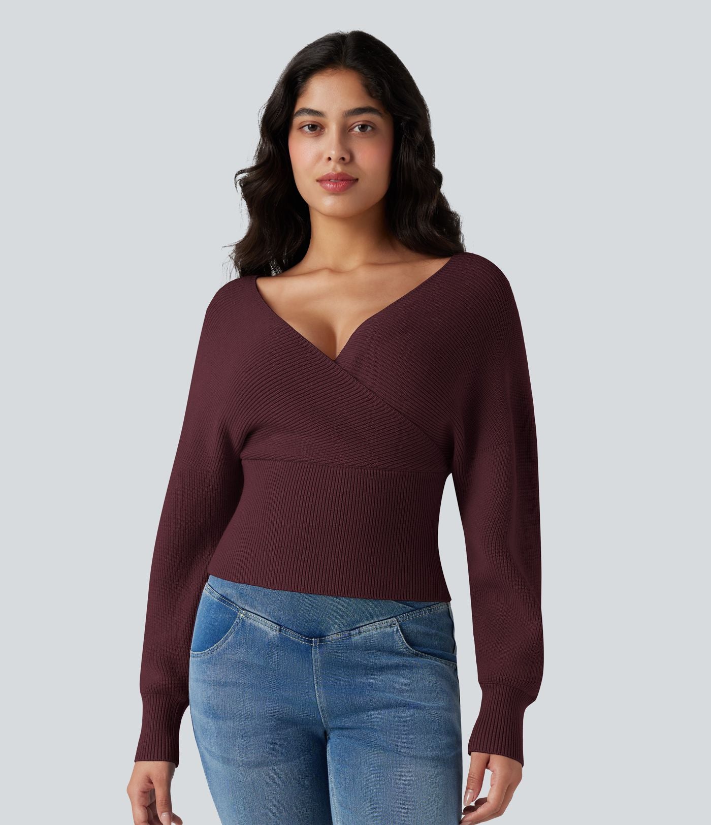Pull col V manches chauve-souris longues à découpes