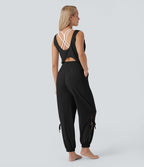 Combinaison de yoga col bateau sans manches dos nu avec découpes et poches latérales à cordon de serrage effet frais InstantCool, protection solaire UPF50+