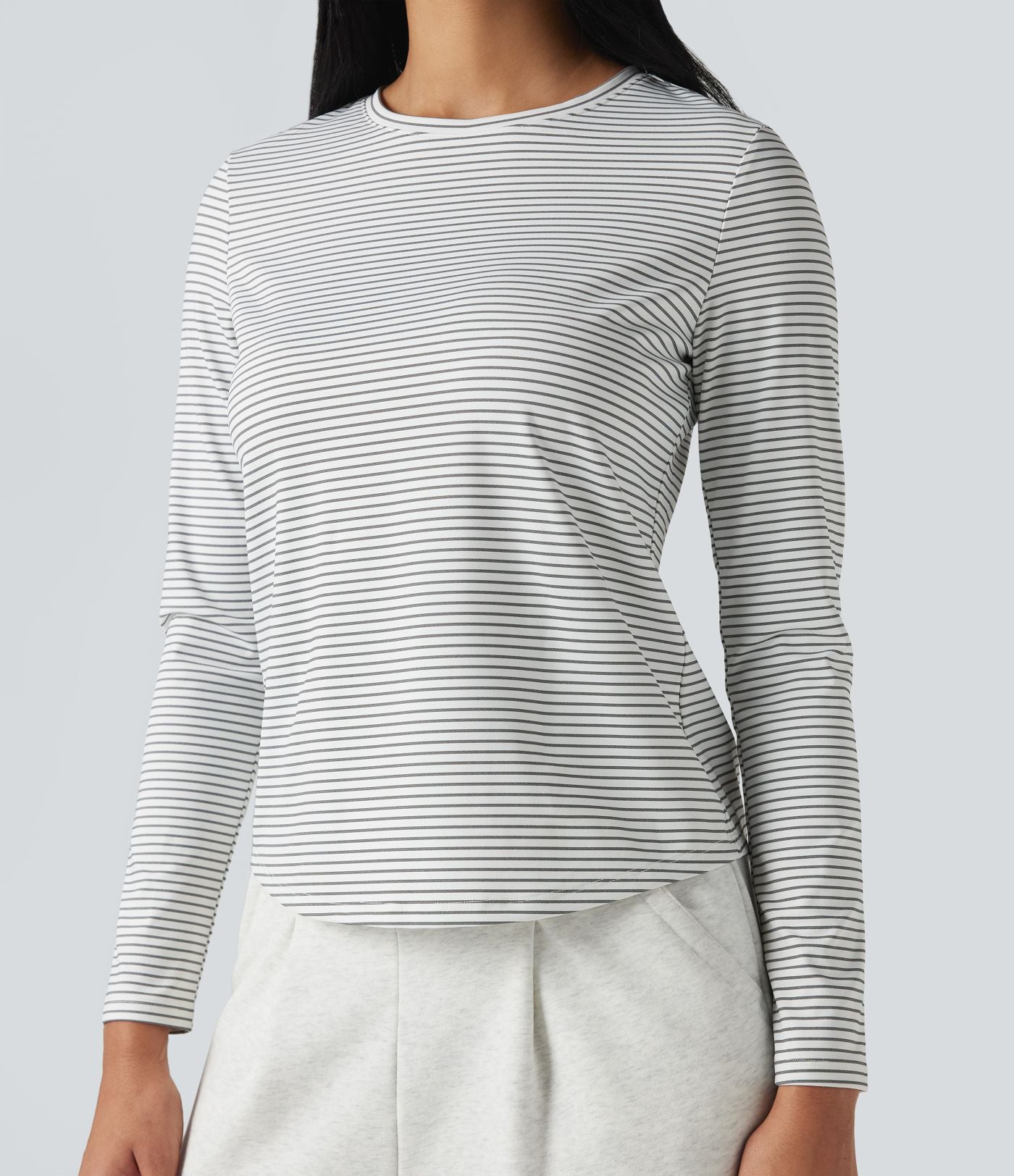 Top de sport yoga rayé ourlet arrondi col rond manches longues