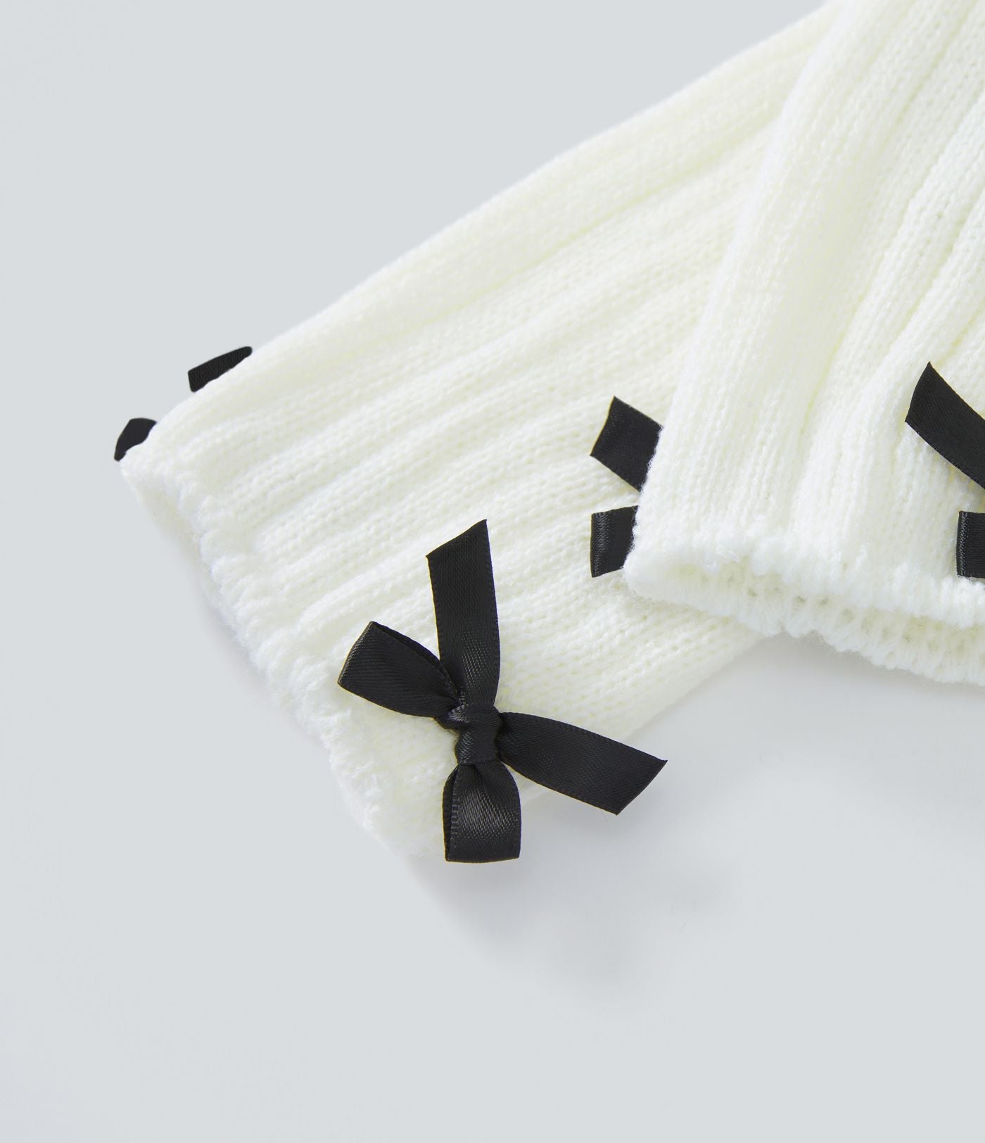 Jambières en maille avec nœud