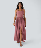 Robe longue fluide fendue avec poches latérales, dos nu et effet torsadé