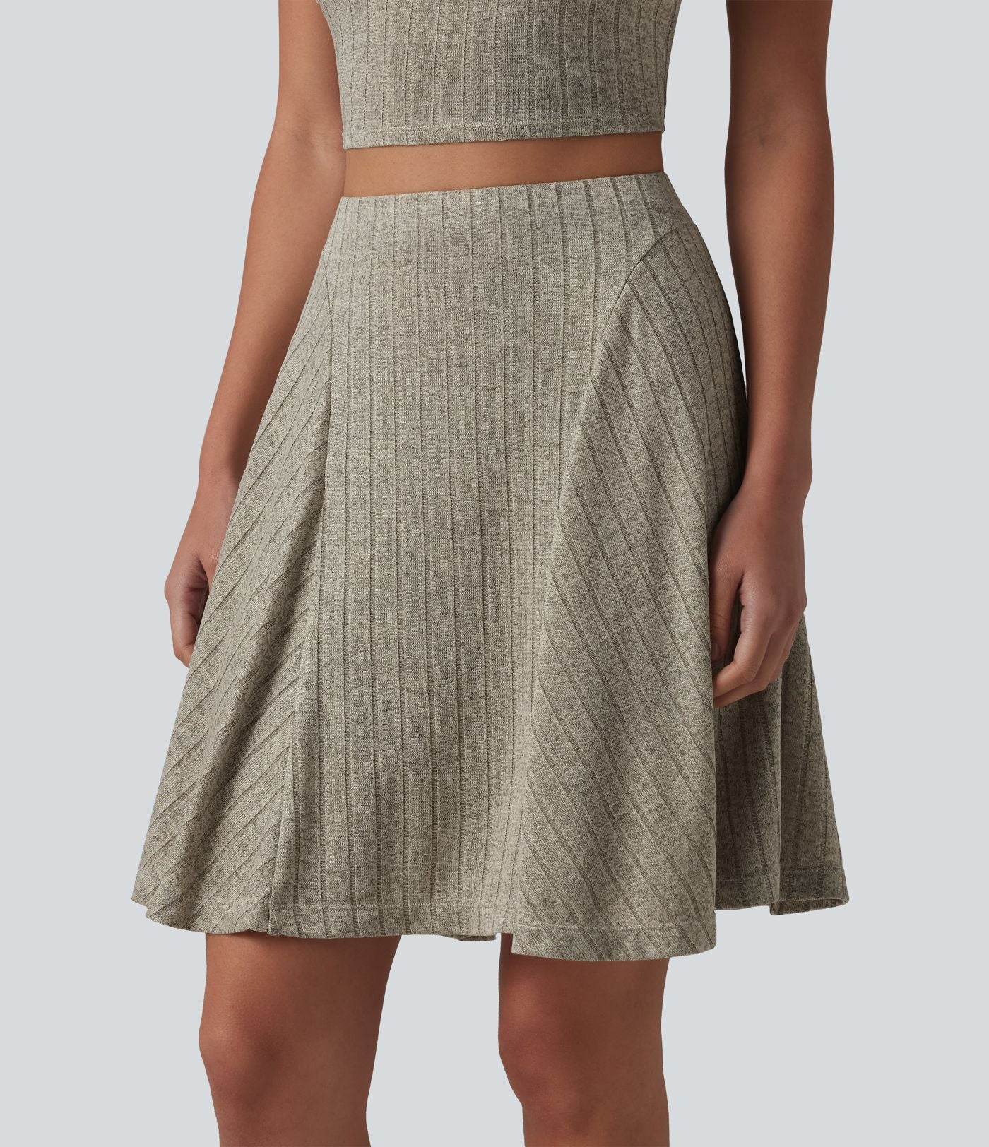 Jupe mini évasée casual 2 en 1 en maille côtelée taille haute avec poches