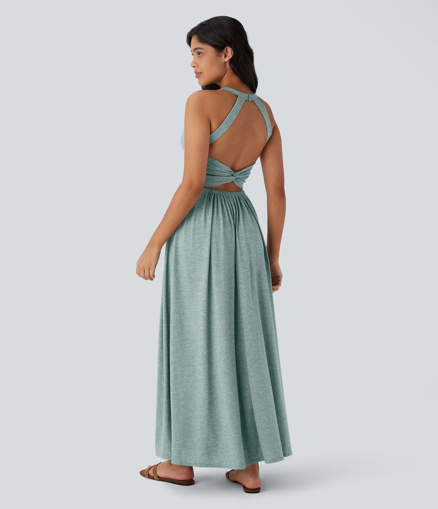 Robe longue fluide fendue avec poches latérales, dos nu et effet torsadé