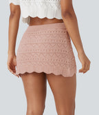 Jupe-short courte en maille ajourée taille haute avec poches latérales