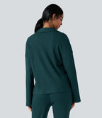 Top détente gaufré col tailleur manches longues boutonnage décontracté