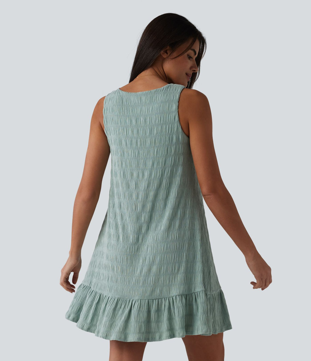 Robe courte décontractée sans manches à col rond, soutien-gorge intégré et ourlet à volants