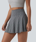 Jupe de sport mini gainante 2-en-1 taille haute à rayures avec poches