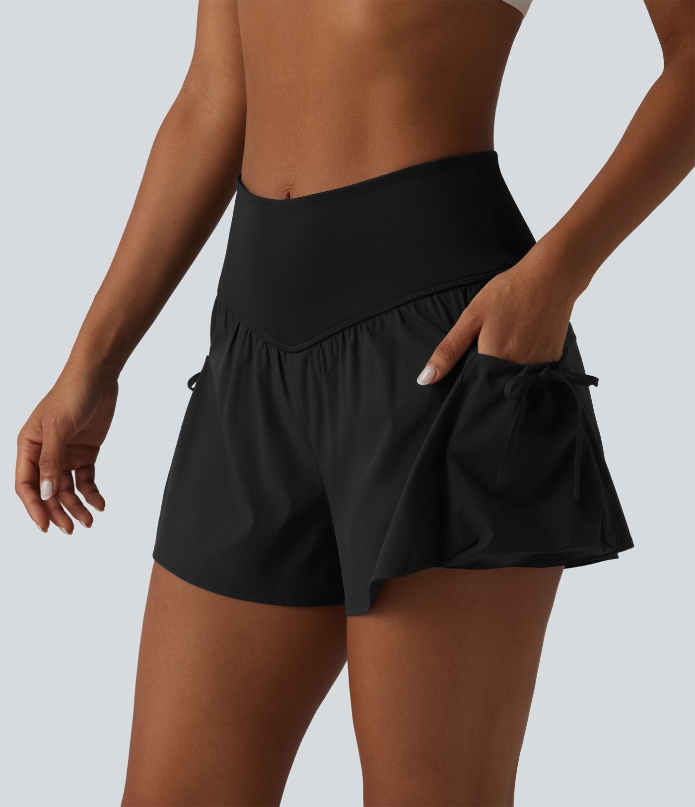Short de sport ample 2 en 1 taille haute avec poches
