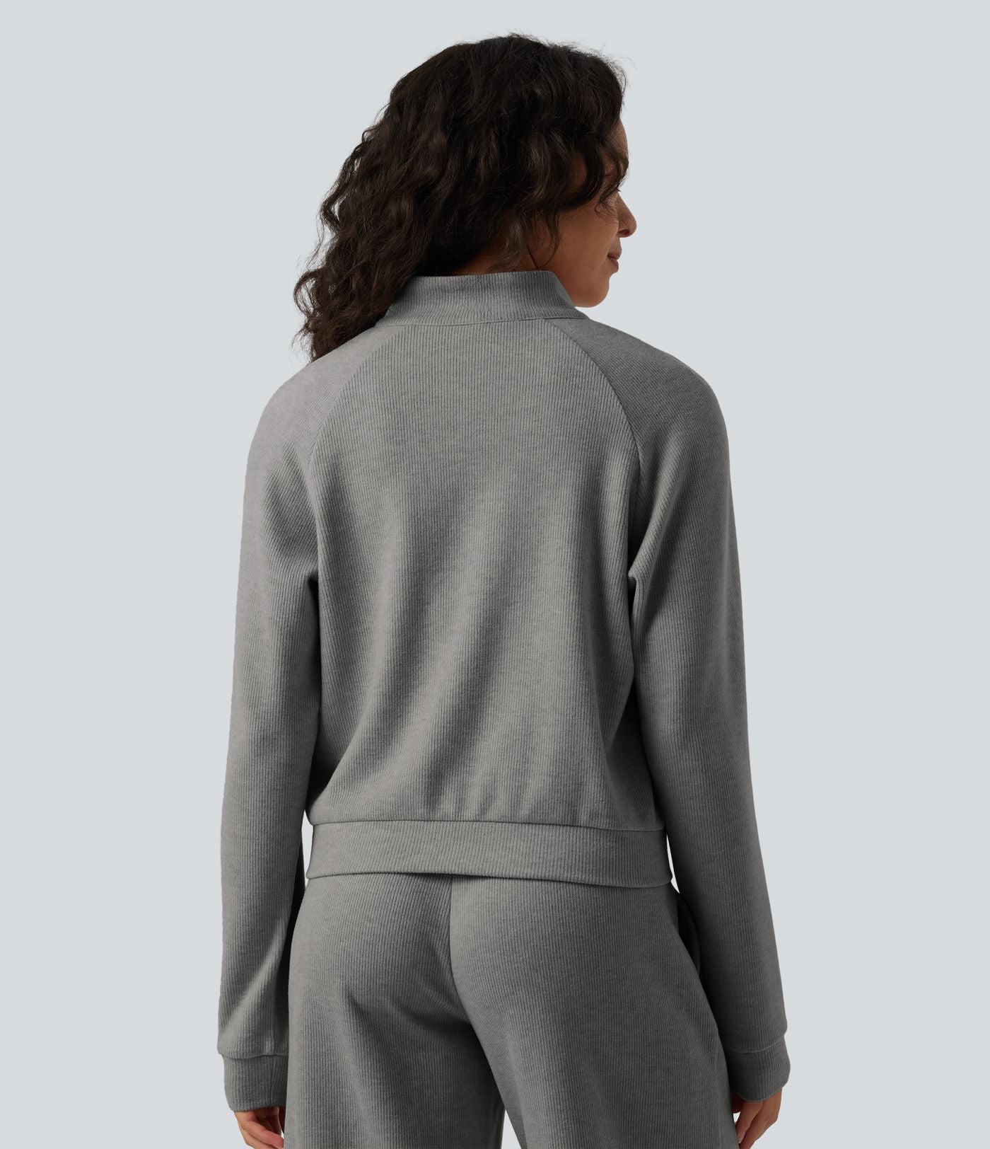 Veste casual côtelée à col montant, manches longues et fermeture zippée avec poches