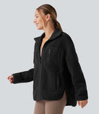Veste de sport sherpa à manches longues avec ourlet asymétrique arrondi et poches