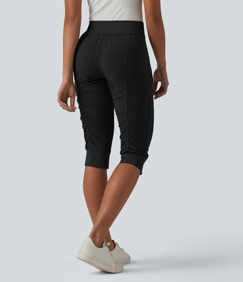 Jogging fuselé taille haute avec cordon de serrage et poches zippées