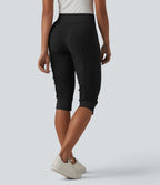 Jogging fuselé taille haute avec cordon de serrage et poches zippées