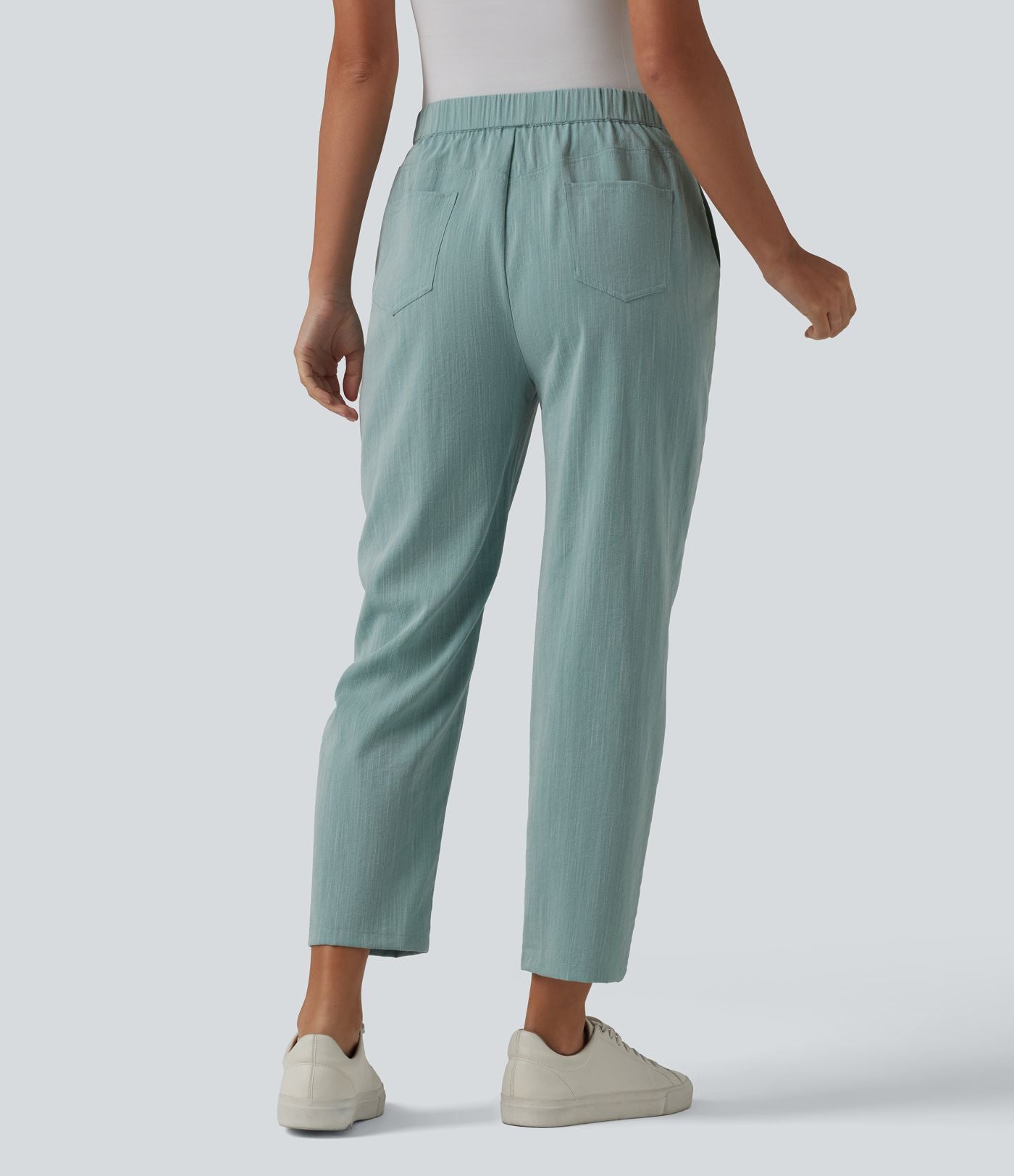 Pantalon tailleur aspect lin fuselé taille haute asymétrique avec poches