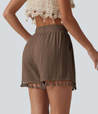 Short ample de vacances en mélange de lin taille haute avec cordon de serrage et ourlet à franges à poches