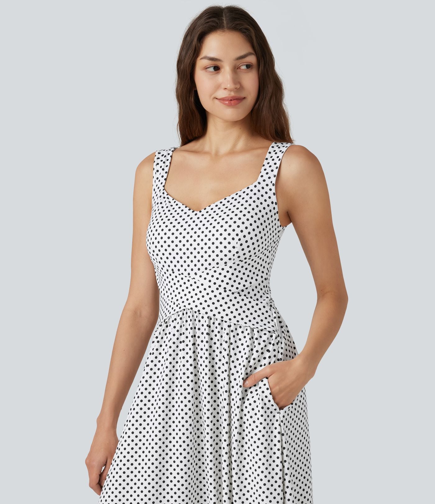 Robe fluide décontractée midi sans manches dos nu croisée à pois avec poches