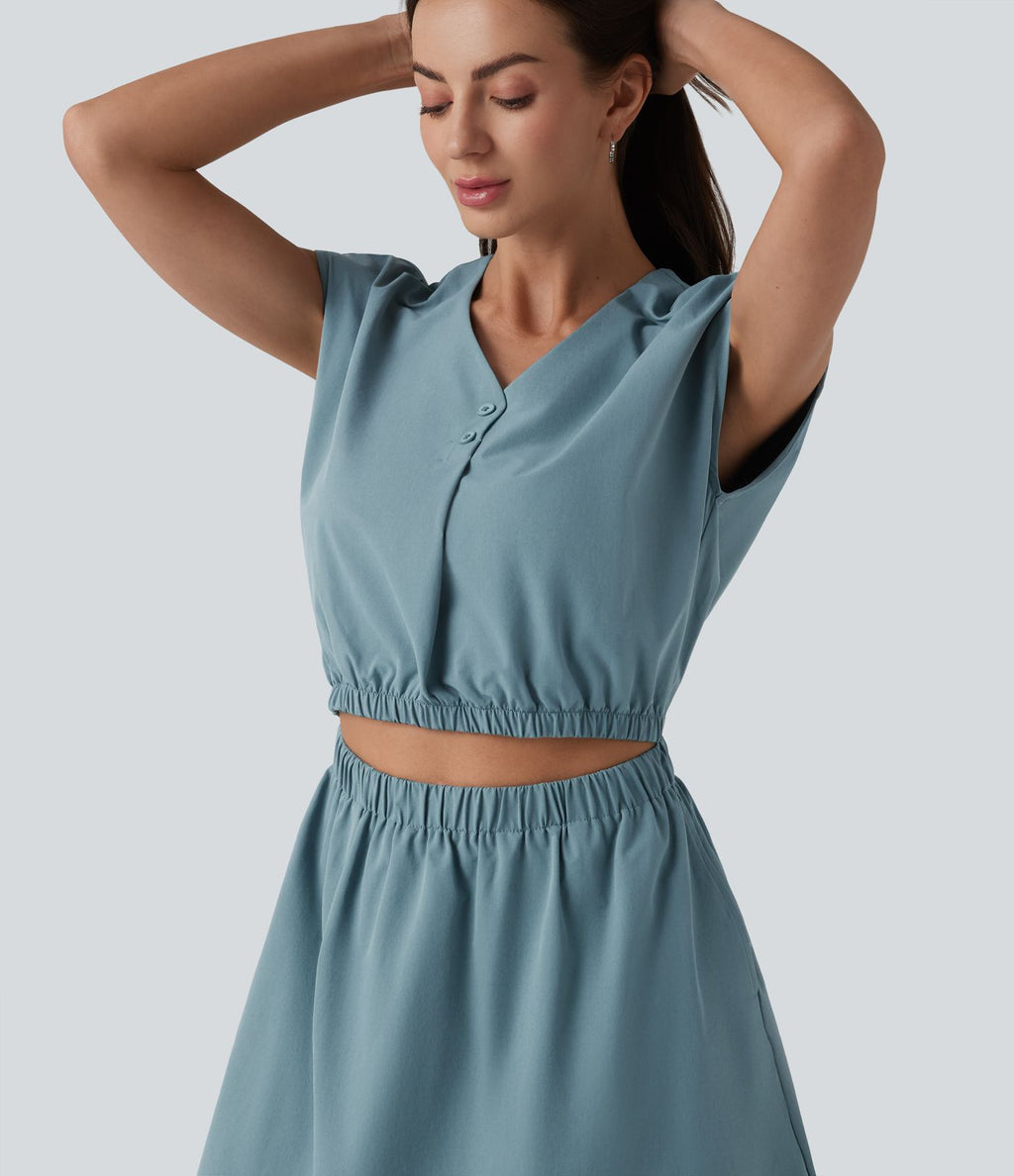 Robe col V manches courtes à découpes en popeline extensible avec poches