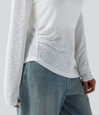 T-shirt décontracté semi-transparent une épaule dénudée à manches longues et ourlet asymétrique