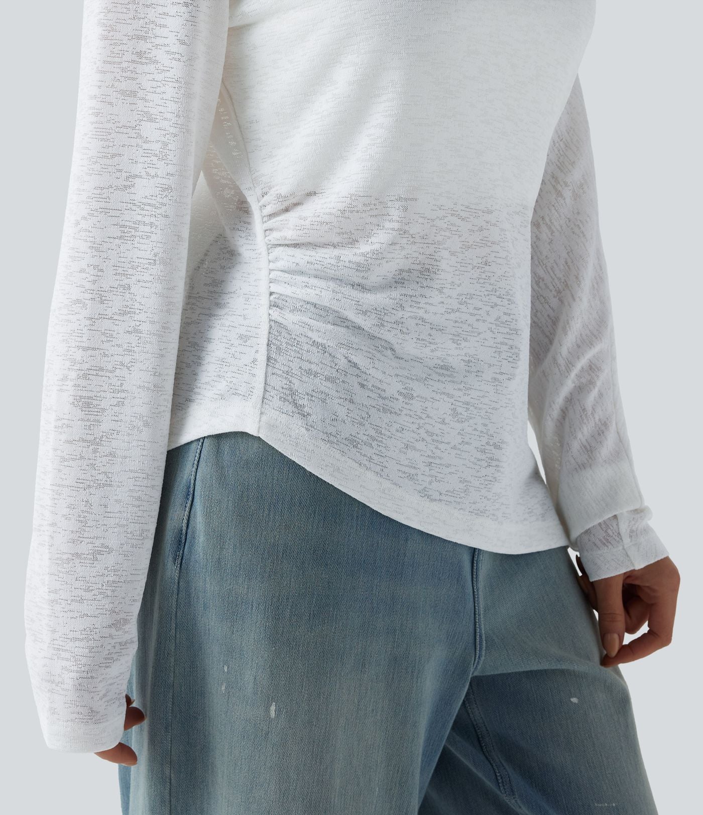 T-shirt décontracté semi-transparent une épaule dénudée à manches longues et ourlet asymétrique