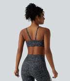 Brassière de sport d'entraînement à maintien moyen imprimé léopard et rayures color block Halara UltraSculpt™