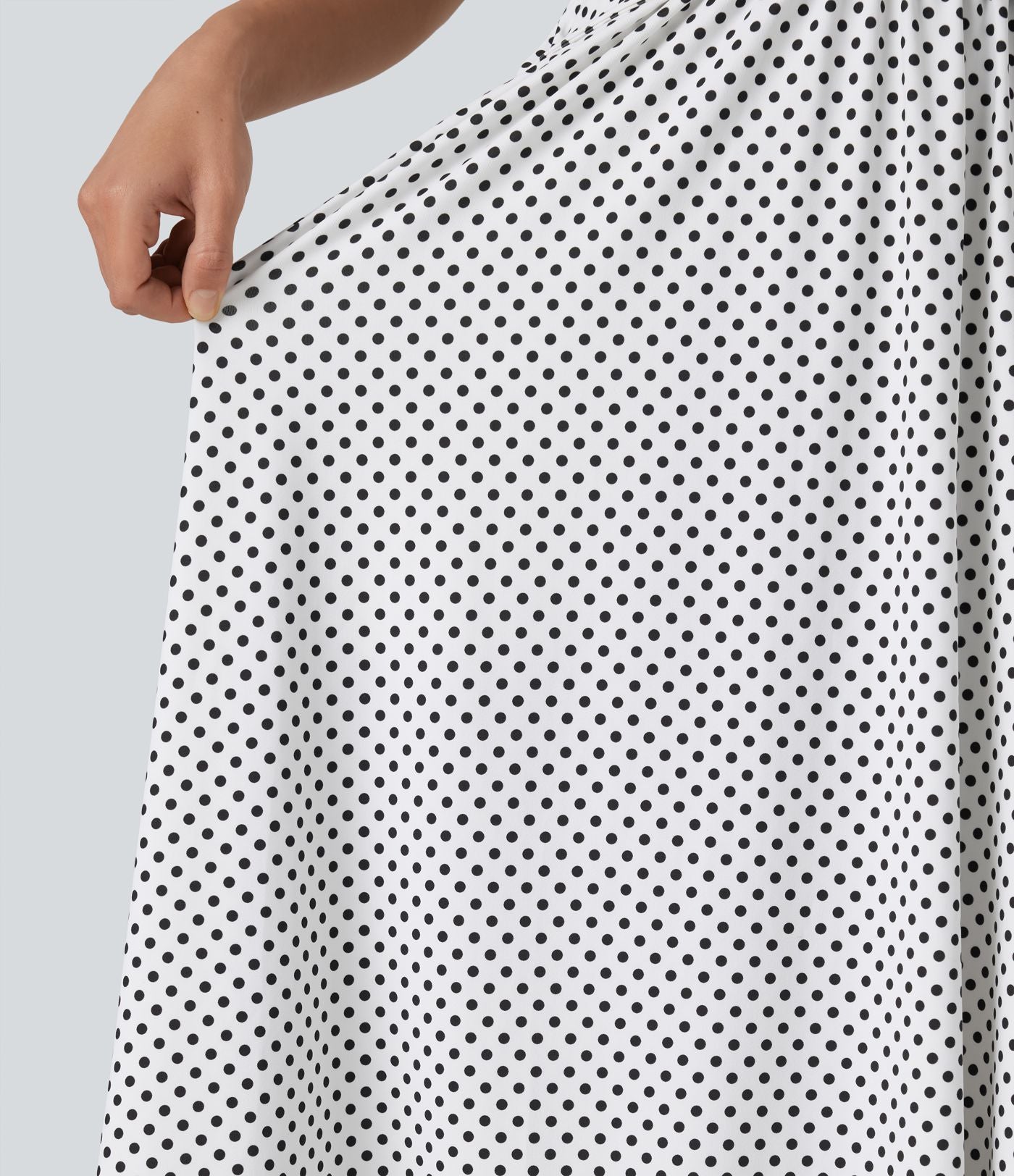 Robe fluide décontractée midi sans manches dos nu croisée à pois avec poches