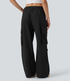 Pantalon cargo décontracté à taille moyenne, jambes larges, boutons, fermeture éclair et poches latérales
