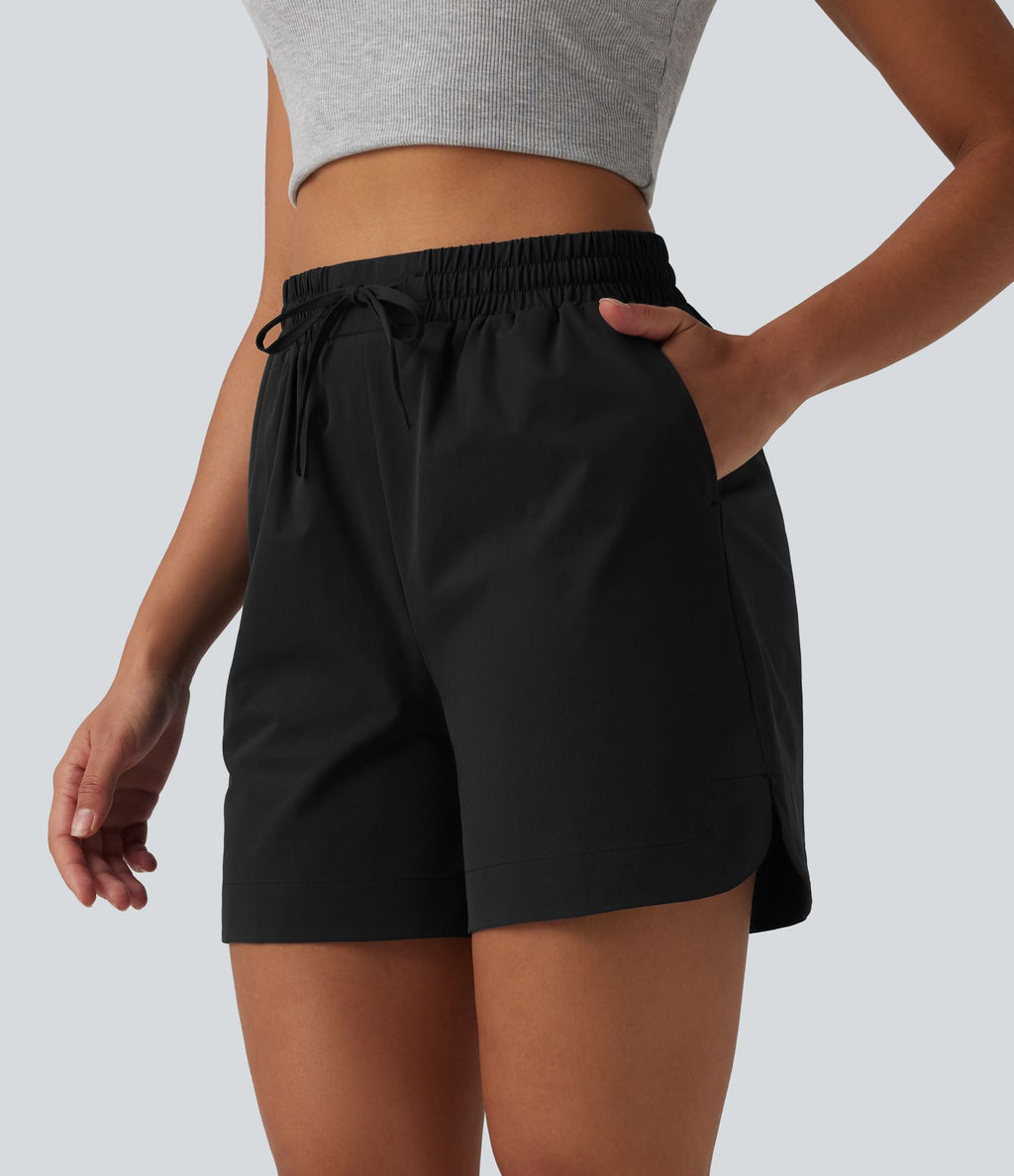 Short ample décontracté taille haute avec cordon de serrage ourlet arrondi avec poches